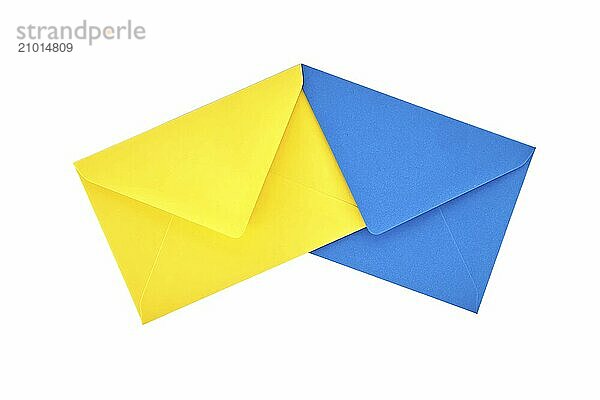 Yellow and blue paper envelopes arranged against a white background