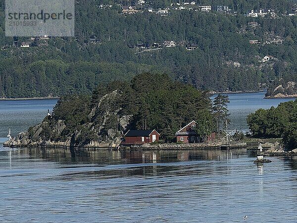 House and boathouse on a small island on the Oslofjord in Norway