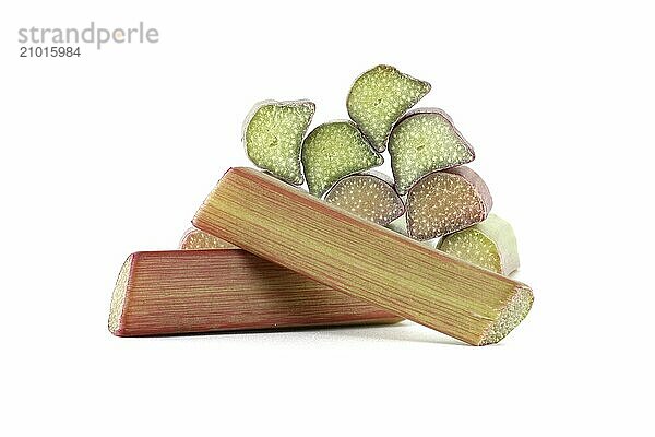 Variety of rhubarb stalks of varying colors from pale green to deep red isolated on white background  health benefits of eating rhubarb