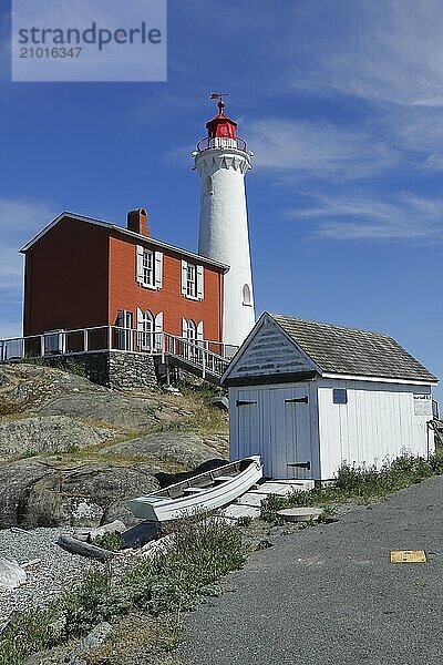 A close up of FIsgard Lighthouse under a clear sky in Victoria BC  Canada  North America