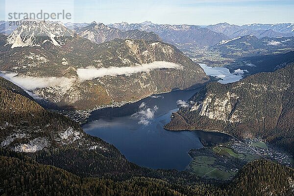 View from the Dachstein Krippenstein to Lake Hallstatt. Hallstatt on the left  Obertraun on the right. Autumn  good weather. Some clouds in the mountains. Lake Hallstatt  Salzkammergut  Upper Austria  Austria  Europe