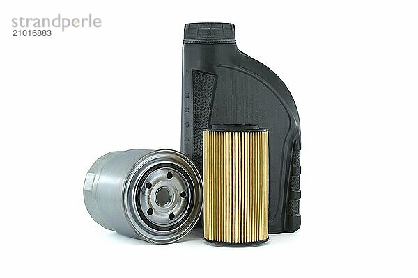 Motor oil and oil filters isolated on a white background. Car servicing  automotive industry or oil and filter replacing maintenance