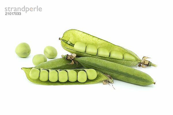 Pea pods  few peas and open pea pod and round green peas inside in close up isolated on white background