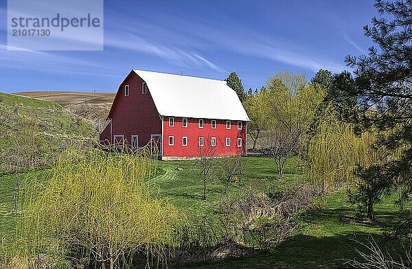 A bright red barn in the Palouse region of eastern Washington