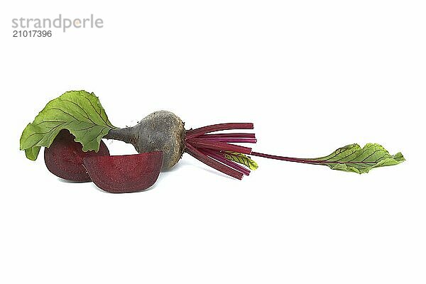 Fresh whole and sliced beet  beetroot isolated on white background