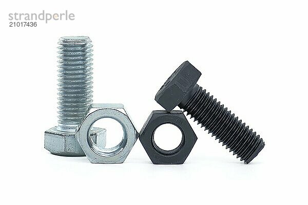 Zinc plated and coated with black oxide hexagon bolts and nuts isolated on white background