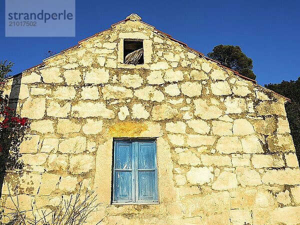 Facade of an old stone house  Pomena  Croatia  Europe