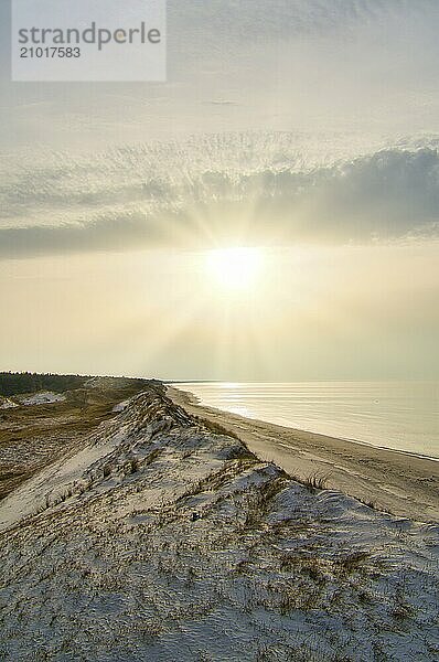 Sunset at the high dune on the darss. Viewpoint in the national park. Beach  Baltic Sea  sky and sea. Nature shot in Germany