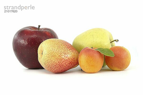 Whole ripe apricots  multicolored pear and apple isolated on a white background. Multivitamin and juicy rich fruits