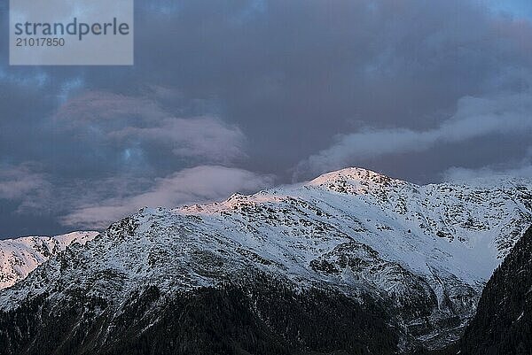 The snow-covered  3113 metre-high summit of the Flimkanzel (right side of picture) in South Tyrol  Italy  Europe