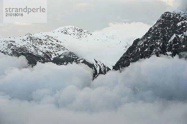 The snow-covered  3113 metre-high summit of the Flimkanzel (centre) in South Tyrol  Italy  Europe