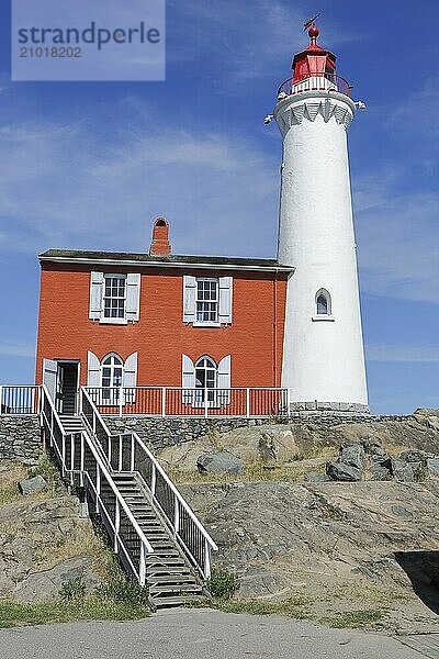 A close up of FIsgard Lighthouse under a clear sky in Victoria BC  Canada  North America