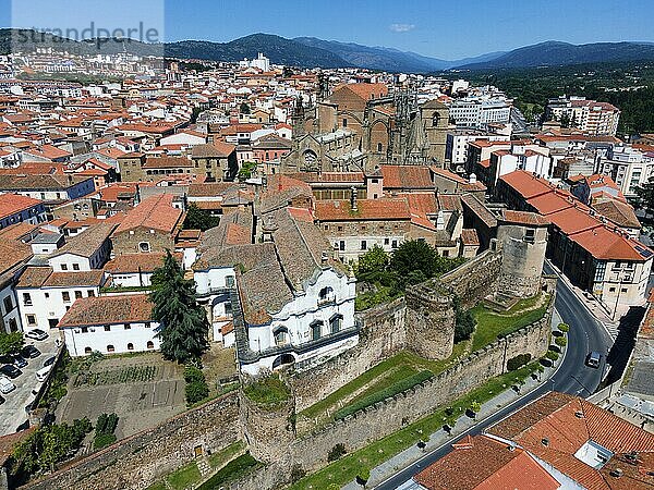 Historic buildings with red tiled roofs and castle walls in a town on a sunny day  aerial view  Plasencia  Cáceres  Caceres  Extremadura  Spain  Europe