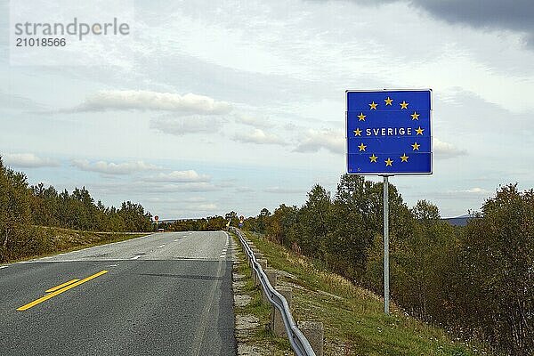 European sign on a road  showing the border to Sweden under a cloudy sky  Jämtland  Sweden  Europe