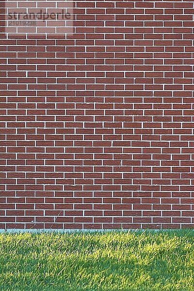 A brick wall with a meadow in front of it  Ontario  Canada  North America