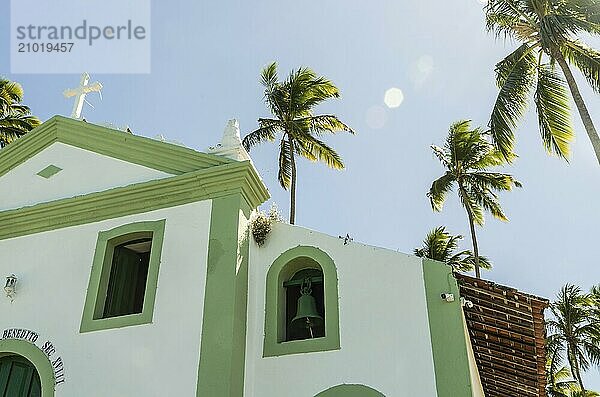 Beautiful view of (Capela de São Benedito) Chapel of St. Benedict and Carneiros Beach (Praia dos Carneiros)  Pernambuco  Brazil. Secular Chapel of Carneiros Beach. Church in the beach with palm trees