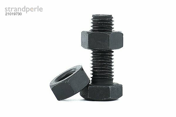 Black metal hexagonal bolt and nut shown in close-up isolated on white background