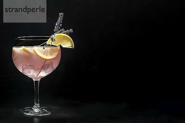 Fancy cocktail with fresh fruit. Gin and tonic drink with ice at a party  on a black background. Alcohol with lavender and lemon  with copy space  Food photography