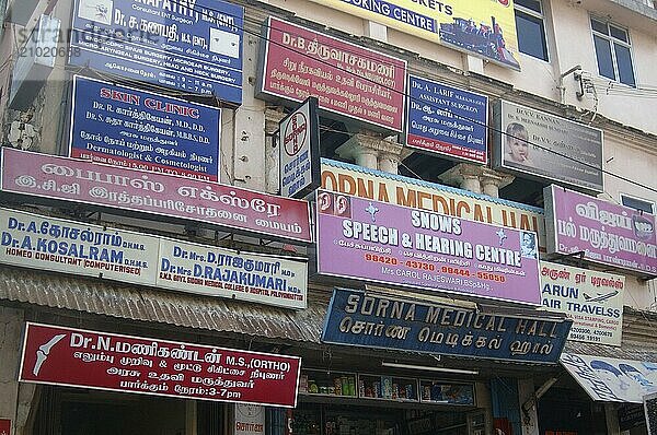 A mass of signage advertising medical services in Tirunelveli  Tamil Nadu  India  Asia