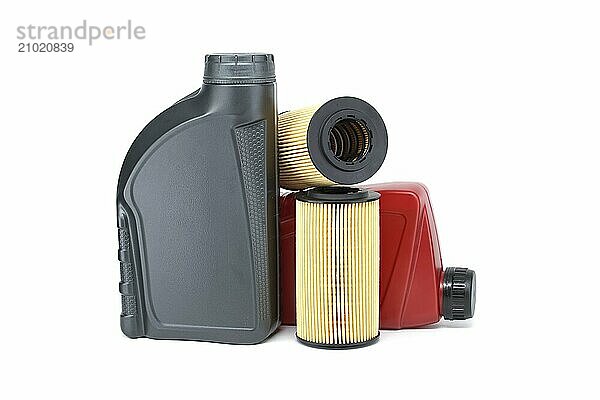 Motor oil filters elements oil and containers isolated on a white background. Car servicing  automotive industry and filter replacing maintenance