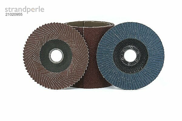 Array of abrasive discs in close-up view isolated on white background  typically used for grinding  sanding  and polishing in various industries