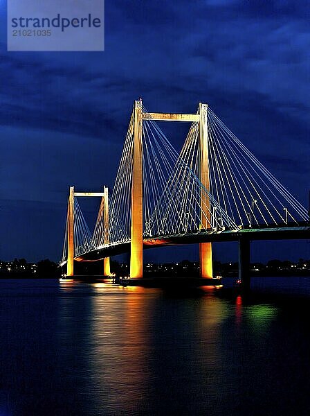 Evening shots of Benton Franklin intercounty bridge lit up over the Columbia River in Kennewick  Washington