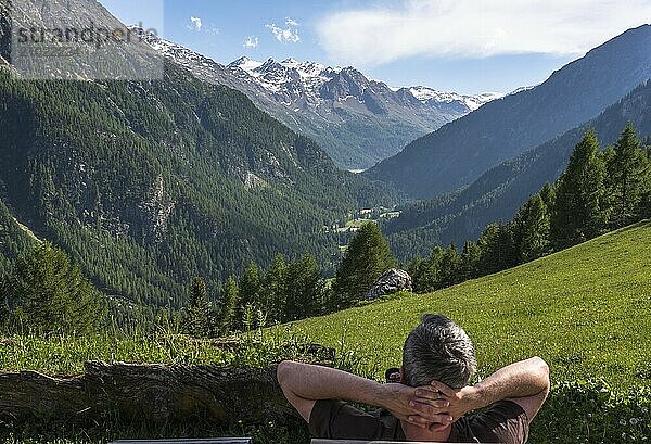 A man enjoys the view on holiday in South Tyrol