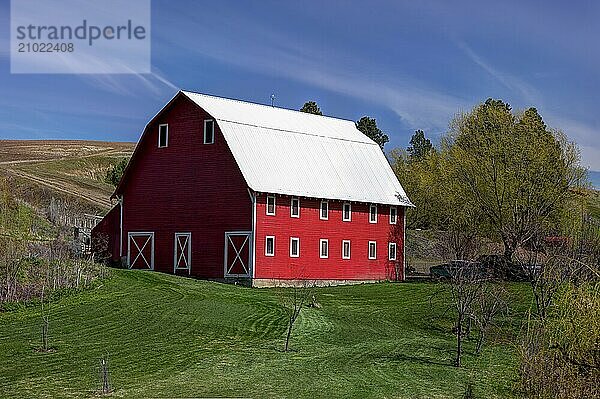 A bright red barn in the Palouse region of eastern Washington