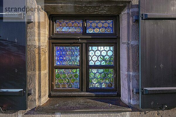 Old Franconian bull's-eye windows on a historic pub  Nuremberg  Middle Franconia  Bavaria  Germany  Europe