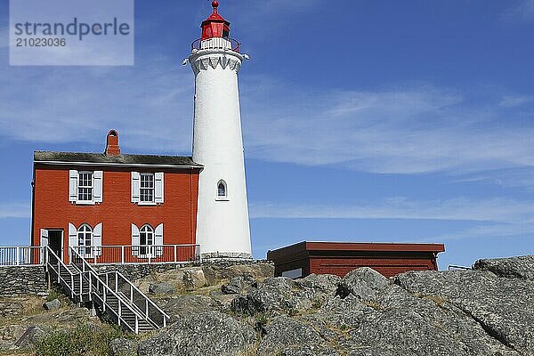 A close up of FIsgard Lighthouse under a clear sky in Victoria BC  Canada  North America