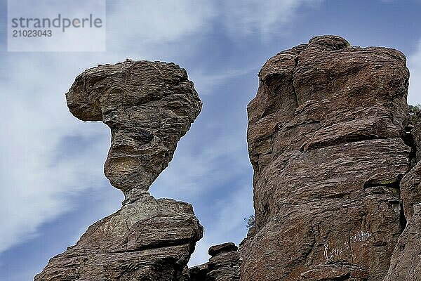 A clear photo of the famous balanced rock set against a partly cloudy sky near Buhl  Idaho