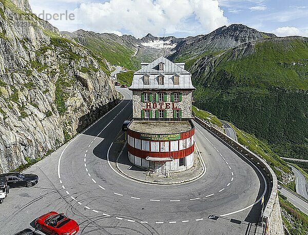 Hotel Belvédère on the Furka Pass  the most famous pass hotel in the world. The building is closed and falling into disrepair. A lost place. Drone photo. Obergoms  Canton Valais  Switzerland  Europe