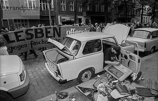 Germany  Berlin  07.06.1991  Lesbian and gay demo  a Trabi being repaired  Europe