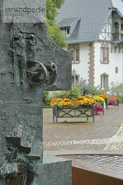 Fountain with sculpture of the Hornberg shooting  cannon  bronze  historical and famous saying  idiom  proverb  historical fountain  shooting  Hornberg  Ortenau  Southern Black Forest  Black Forest  Baden-Württemberg  Germany  Europe