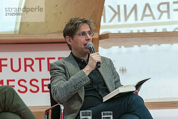 FRANKFURT AM MAIN  Germany  October 21 2023: Daniel Kehlmann (*1975  German-language novelist) reads at the 75th Frankfurt Book Fair  Europe