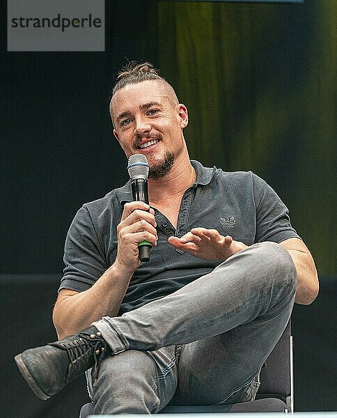 STUTTGART  GERMANY  JUN 29th 2019: Alexander Dreymon (*1983  German actor and film actor) talks about his experiences in the movie industry at Comic Con Germany Stuttgart  a two day fan convention