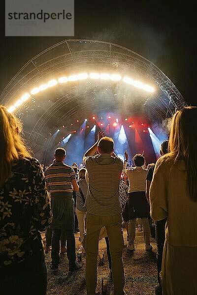 At night at an open-air concert  illuminated stage and crowd  Klostersommer  Calw Hirsau  Black Forest  Germany  Europe