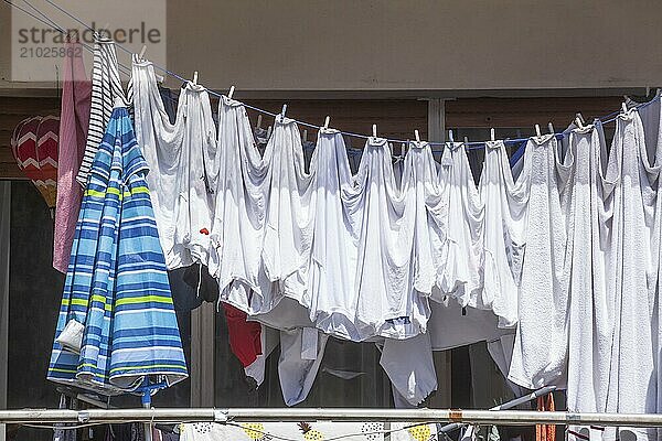 Clothesline with hanging laundry on a balcony  Diepholz  Lower Saxony  Germany  Europe