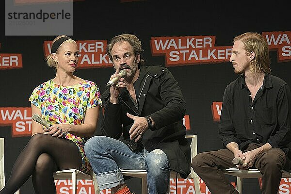 MANNHEIM  GERMANY  MARCH 17: (L to R) Actors Pollyanna McIntosh  Steven Ogg  Austin Amelio (The Walking Dead)  panel  at Walker Stalker Germany convention. (Photo by Markus Wissmann)