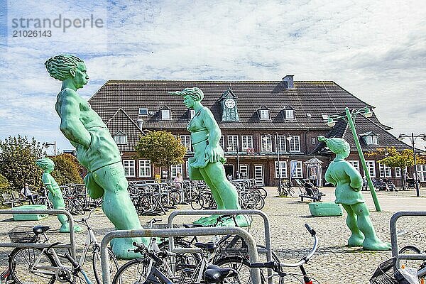 Sculpture group Travelling Giants in the Wind by Martin Wolke in front of Westerläand railway station  island of Sylt  Germany  Europe