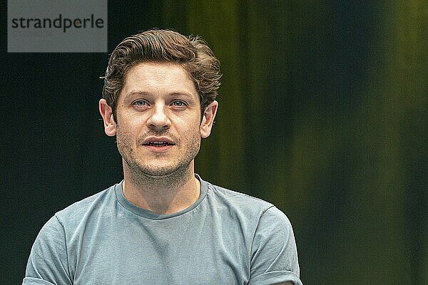 STUTTGART  GERMANY  JUN 29th 2019: Iwan Rheon (*1985  Welsh actor  singer and musician) talks about his experiences in the movie industry at Comic Con Germany Stuttgart  a two day fan convention