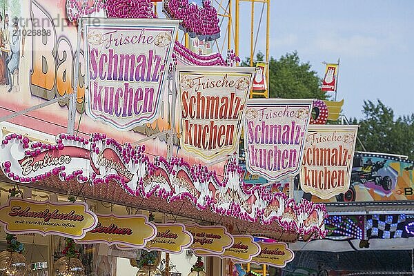 Sign for fresh lard cake at a food stall at the Hamburger Sommerdom fair  Hamburg  Germany  Europe