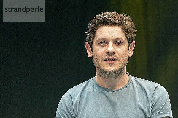 STUTTGART  GERMANY  JUN 29th 2019: Iwan Rheon (*1985  Welsh actor  singer and musician) talks about his experiences in the movie industry at Comic Con Germany Stuttgart  a two day fan convention