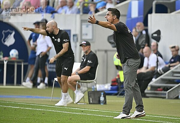 Coach Marcel Rapp Holstein Kiel KSV on the sidelines  gestures  gesture  behind him co-coach Alexander cock Holstein Kiel KSV  PreZero Arena  Sinsheim  Baden-Württemberg  Germany  Europe