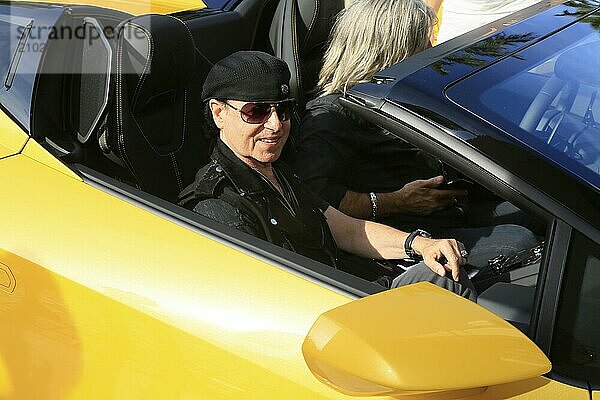 Drummer Mikkey Dee of the hard rock band Scorpions is delivered a yellow Lamborghini in front of a concert in the Principality of Monaco  here Klaus Meine