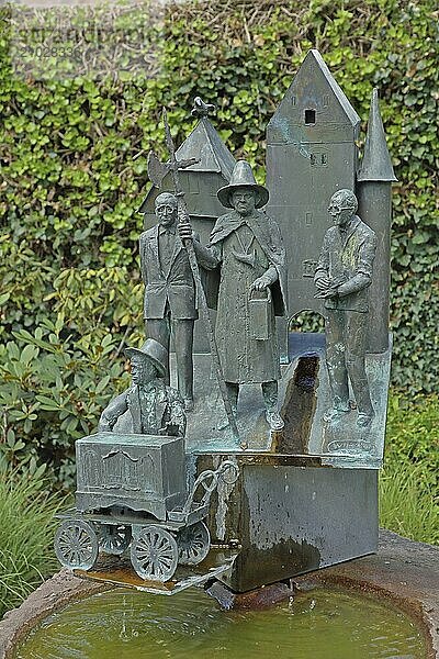 Historian's fountain with figures on the town's history  four  sculptures  bronze  barrel organ player  night watchman  lance  fountain  Zell am Harmersbach  Ortenau  Southern Black Forest  Black Forest  Baden-Württemberg  Germany  Europe