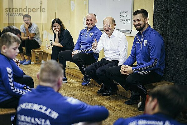 Federal Chancellor Olaf Scholz  (SPD)  photographed during a visit to RC Germania in Potsdam on the occasion of his summer tour. 29.08.2024