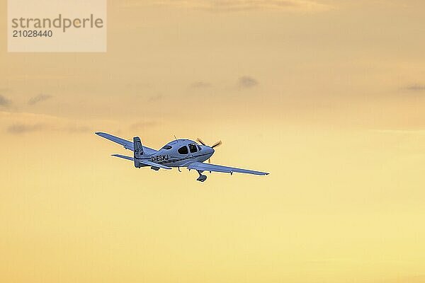 Passenger aircraft after take-off  small aircraft  propeller aircraft  Baden-Württemberg  Germany  Europe