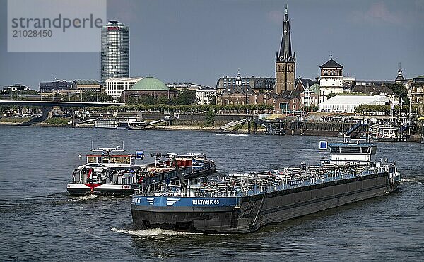 Shipping traffic on the Rhine near Düsseldorf  off the banks of the old town  freighter Franca and tanker Eiltank 65  North Rhine-Westphalia  Germany  Europe