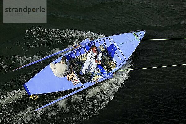 Souvenir dealer with a rowing boat on the Nile  Egypt  Africa